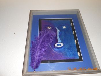 Shadow box, bones, cowie shells & beads
