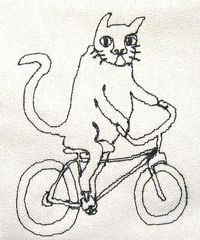 Cat riding a bicycle