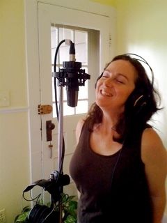 AnnMarie singing in Ken's living room, above his studio, Sawdust.
