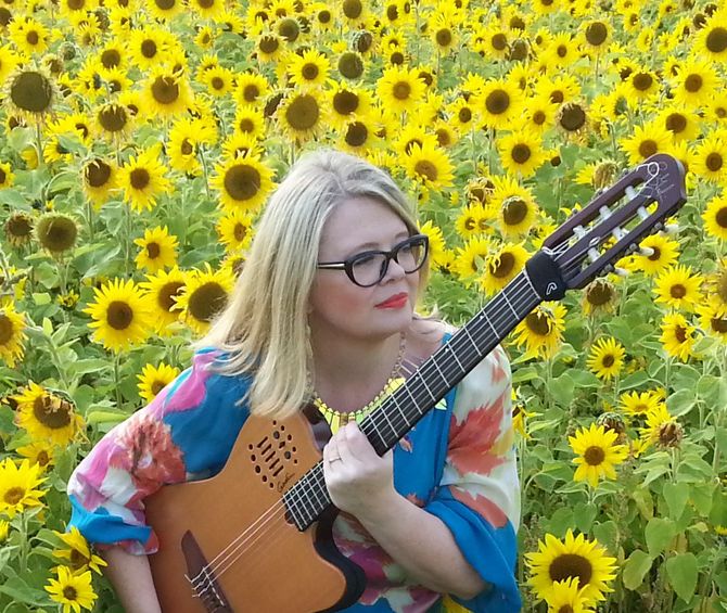 Guitarist performing for Garden Party