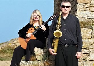 guitar and sax duo performing at Jersey castle