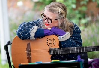 smiling guitarist at wedding ceremony gig