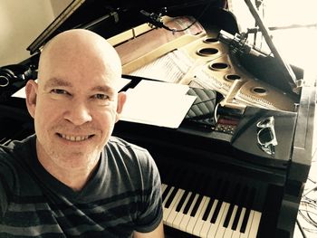 Happy at the piano
