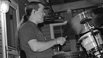 Sean Dolan (drums/vocals) at backyard party
