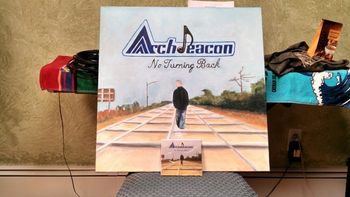 Painting (2'x2') of "No Turning Back" next to real album
