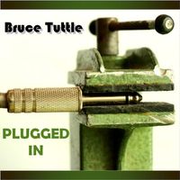 Plugged In by Bruce Tuttle