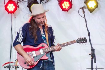 Kevin Kinsella making the music nice! Espace Culturel Ashukan 5th Mixed Arts Festival June 16-18, 2017 Montreal, QC  © Espace Culturel Ashukan, Red Works Photograhy — in Montreal, Quebec.
