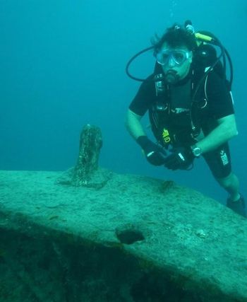 "AT THE BOW" . . . of the Thislegorm, one of the most famous wrecks in the Red Sea,
