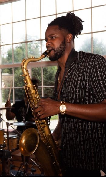 Dahi Divine saxophonist
