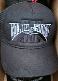 Color of Chaos All Black w Grey Distressed Trucker Hat
