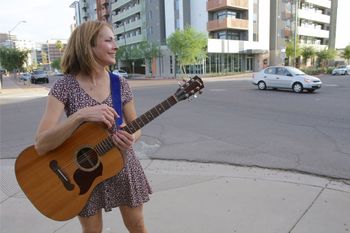 standing on the corner on a hot day-still smiling!
