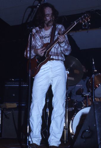 And another from that night at My Father's Place. The guitar was my beloved Gibson SG, which by them had been refinished and given toggle switches for in/out-of phase and series/parallel wiring when both pickups were on. These were some of my first tries at guitar modification, an addiction I still struggle with today.
