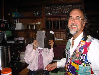 Douglas attempts to pry a smile from the shy waitress.
