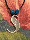 Official Surfaris "S" Pendant with leather cord and 2 beads (click for more options)
