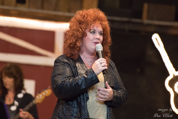 CHRISTY MILLER AS REBA McENTIRE
