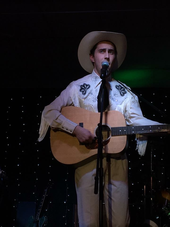 JOSH McMILLEN AS HANK WILLIAMS, SR.
