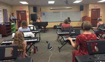 Eden Brent leads a blues and boogie woogie workshop at Fairview Elementary, Aug. 13, 2018
