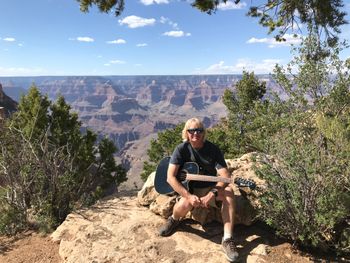 Mike picking some tunes along the South Rim of Grand Canyon National Park
