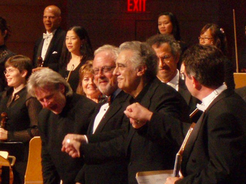 Carl St. Clair, conductor [bowing], composer William Bolcom and tenor Placido Domingo at the premiere of Canciones de Lorca Orange County Performing Arts Center on Sept. 15, 2006.
