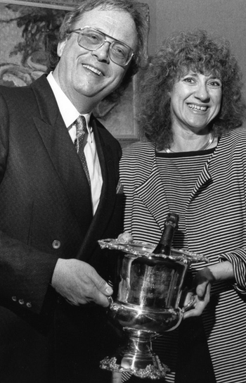 Bill and Joan holding a champagne bucket presented to Bill by BMI on the occasion of his receiving the 1988 Pulitzer Prize in Music for his "12 New Etudes for Piano."
