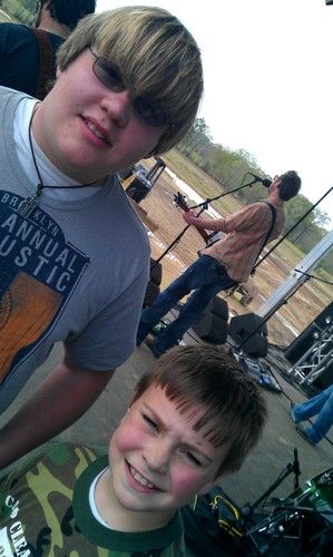 Landry & Cardis with JB and The Moonshine Band during sound check at Mud Truck Madness 2013.
