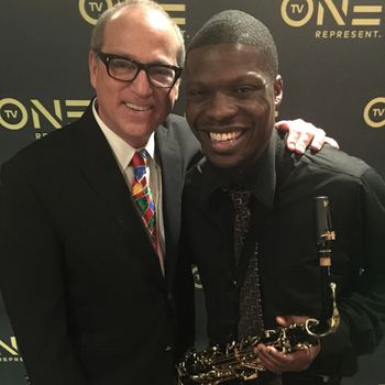 TV One CEO Brad Siegel and I after performing for TV One's Holiday Party
