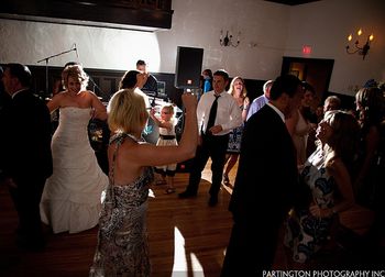 Bride and her family having a blast on the dance floor.
