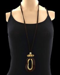 Longevity Pendant long necklace with gold tone accents