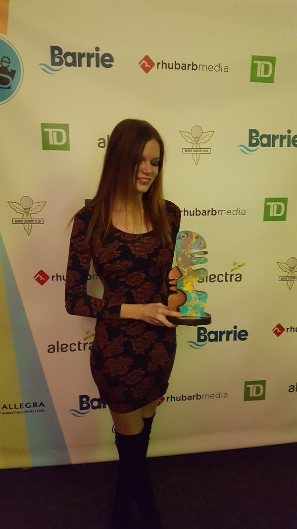 Megan with her Barrie Arts Award - Emerging Artist 2018 