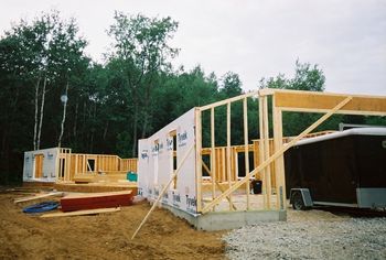 front view of house with garage facing slightly SE (canted)
