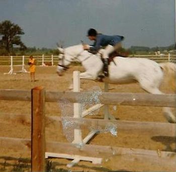 Taking the jump with my mare, Dusty Snow
