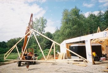 Truss is moved by crane
