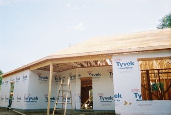 covered kennel area by garage
