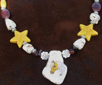 Palomino necklace hand painted, turquoise. silver. $85.00 sold

