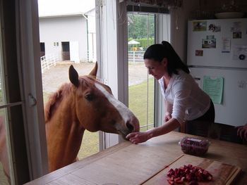 Strawberries at the kitchen table are always good.
