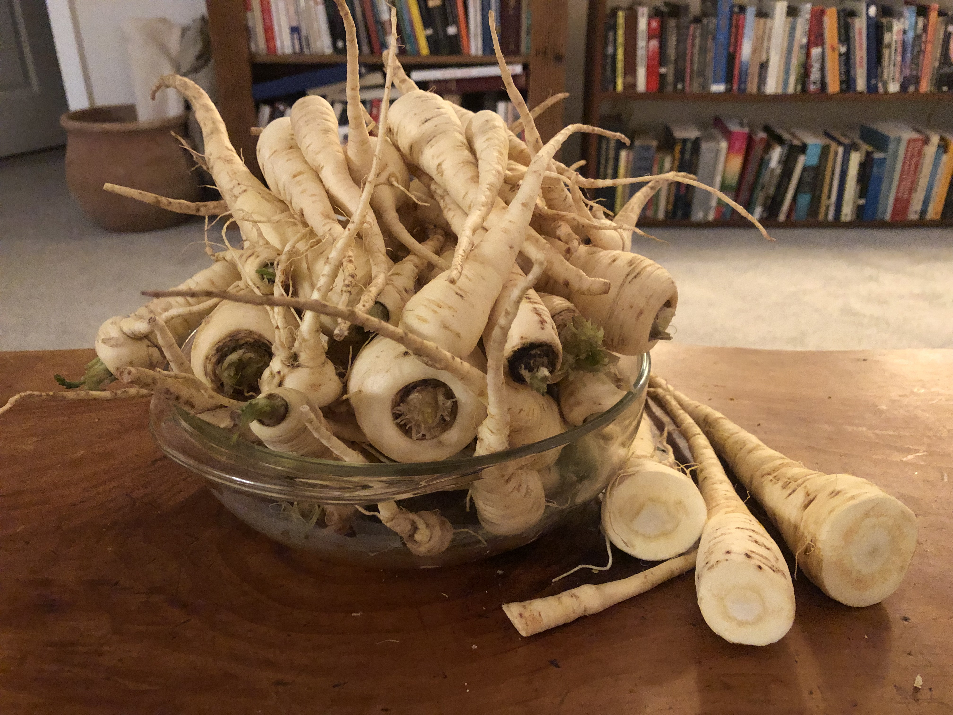 Bowl of scrubbed parsnips.