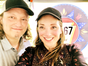 The "hat crew" Dann Araque and Lisa Bodnar keeping cool during the hottest performance ever in Cameron County at the Summer Solstice Evening event in Emporium, PA at the beautiful Andrews Farm.
