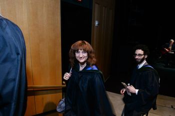 With the faculty during the graduation ceremony at the Pacific College of Health Science.
