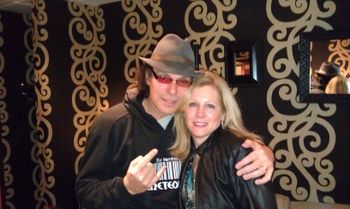 Spouse Unit Joan with Elliott Rubinson CEO of Dean Guitars
