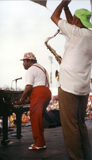 Reggie and Fats Domino on stage at The New Orleans Jazz and Heritage Festival.