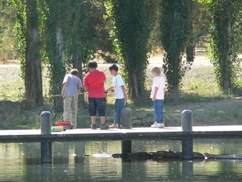 Trying their luck off the dock.
