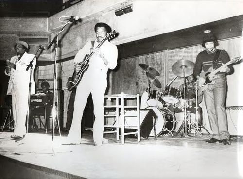 L/R BB Odom, Lucky Peterson, Nick Holt (behind Milton),  Little Milton, Nate Applewhite & John on his first tour as a Teardrop with Magic Slim in France 1983