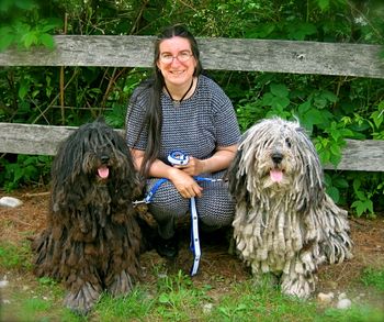 Nina and Metteo with their new AKC Canine Good Citizenship leashes, after passing their tests with flying colors June '09
