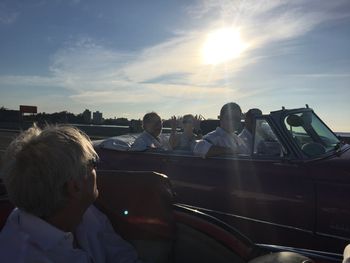 Taking travelers for a ride in classic convertibles
