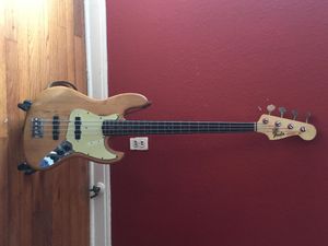 This is my pride and joy, my 1964 Fender Jazz Bass (NOT a reissue). I bought it (ok, my Dad did) in 1966 from a local Dallas talent named Kirby St. Romain. So Kirby, if your out there, I've still got your bass! It originally had matching white on the body, but as the paint was flaking off, I I stripped it and applied clear lacquer for a natural alder wood look. I know the value increases with the original finish no matter how ugly, but in the 70s that wasn't the case. I used it on all of the songs that Marty Mitchell doesn't play bass on.
