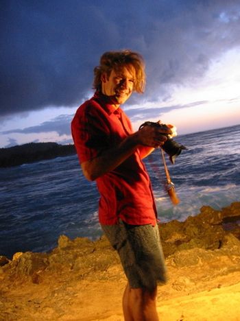 Mark shooting on the North Shore of Hawaii. We had taken a surf lesson that day and were useless. I am quite surprised he was able to hold up the camera. It turns out there had been sharks out on the day we went, but luckily no one told us. They concentrated instead on building up our confidence by focusing on the razor sharp coral we could easily nail ourselves on.
