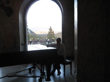 Playing the piano in one of the big open marble ballrooms at the Banff Springs Hotel in Canada
