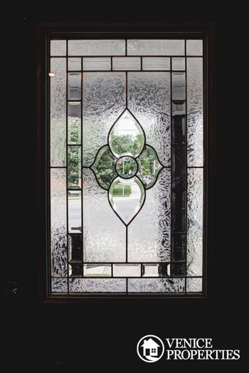 Glass inside of front door
