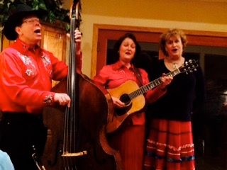 Harmonizing on "Vaya Con Dios" with Carolyn and Dave Martin, house concert, Danville, CA
