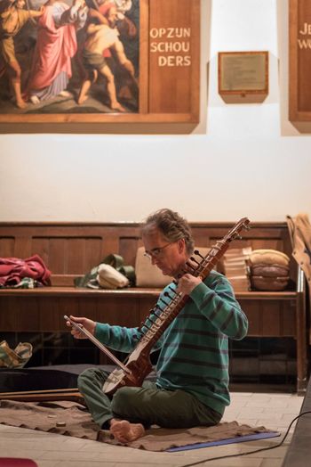 Esraj playing during yoga class in Antoniuskerk Utrecht
